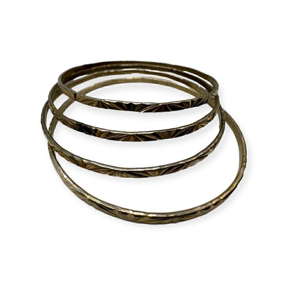 Set of 4 gold-toned bangle bracelets vintage costume jewelry